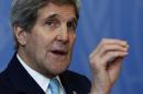 US Secretary of State Kerry gestures during his news conference at the UN in Geneva