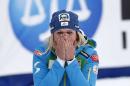 Nicole Hosp, of Austria, reacts after winning the women's World Cup slalom ski race Sunday, Nov. 30, 2014, in Aspen, Colo. (AP Photo/Alessandro Trovati)