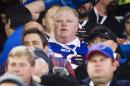 In this Sunday, Dec. 1, 2013 photo, Toronto Mayor Rob Ford watches the Buffalo Bills play the Atlanta Falcons during the first half of an NFL football game, in Toronto. Saying he's a big Washington Redskins fan and will "go on any radio," scandal-plagued Ford has agreed to appear on a Washington-based sports talk show to make NFL picks. (AP Photo/The Canadian Press, Mark Blinch)