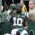 New York Jets wide receiver Santonio Holmes (10) gestures to fans as he is carted off the field after being injured during the second half of an NFL football game against the San Francisco 49ers Sunday, Sept. 30, 2012, in East Rutherford, N.J. (AP Photo/Bill Kostroun)