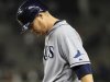 Tampa Bay Rays' Dan Johnson leaves the field after the final out of the Rays' baseball game against the New York Yankees on Tuesday, Sept. 20, 2011, at Yankee Stadium in New York. The Yankees won 5-0. (AP Photo/Frank Franklin II)