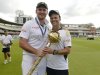 South Africa's captain Smith and coach Kirsten hold the ICC mace on a lap of honour after South Africa defeated England in the third cricket test match at Lord's in London