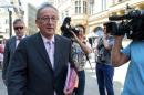 Luxembourg's PM Juncker leaves a meeting with Grand Duke Henri in Luxembourg