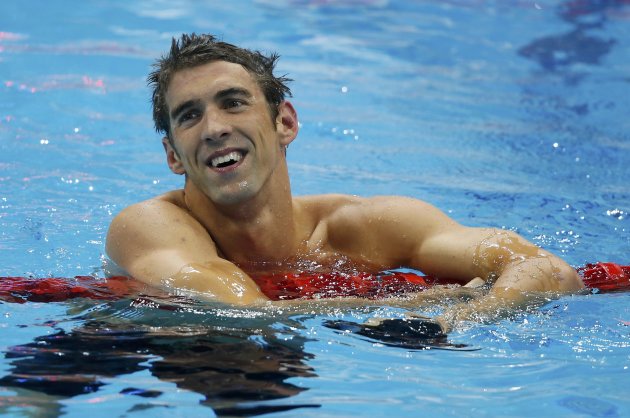Michael Phelps of the U.S. smiles after winning his 19th Olympic medal in the men's 4x200m freestyle relay final during the London 2012 Olympic Games at the Aquatics Centre July 31, 2012.  REUTERS/Jorge Silva (BRITAIN  - Tags: SPORT SWIMMING SPORT OLYMPICS)