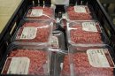 Packs of ground beef are seen in a crate at the Fresh & Easy Neighborhood Market meat processing facility in Riverside