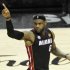 Heat's James reacts after a basket against the Spurs during Game 4 of their NBA Finals basketball series in San Antonio