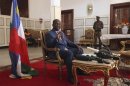 Central African president Bozize speaks during a news conference at the presidential palace in Bangu