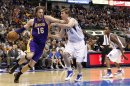 Los Angeles Lakers Gasol drives on Dallas Mavericks Murphy during their NBA game in Dallas
