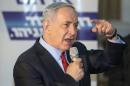 Israeli Prime Minister Benjamin Netanyahu addresses Likud supporters during an election campaign meeting in Netanya, on March 11, 2015