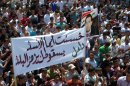 At least 46 people were killed as thousands of Syrians protested on Friday