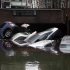 FILE -In this Tuesday, Oct. 30, 2012, file photo, cars are submerged at the entrance to a parking garage in New York's Financial District in the aftermath of superstorm Sandy. Alarming claims that hundreds of thousands of flood-damaged cars from Superstorm Sandy will inundate the used car market aren’t backed up by insurance company claim data, The Associated Press has found. The dire predictions come mostly from companies that track vehicle title and repair histories and sell those reports.(AP Photo/Richard Drew)
