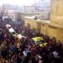 In this image from amateur video made available by the Ugarit News group on Wednesday, Dec. 7, 2011, the coffins of three protesters are carried during a march in Homs, Syria. (AP Photo/Ugarit News group via APTN) THE ASSOCIATED PRESS CANNOT INDEPENDENTLY VERIFY THE CONTENT, DATE, LOCATION OR AUTHENTICITY OF THIS MATERIAL, TV OUT