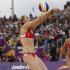 May-Treanor of the U.S. hits the ball past her team mate Jennings during their women's beach volleyball semifinal match against China's Xue and Zhang at Horse Guards Parade during the London 2012 Olympic Games