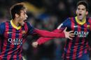 Barcelona's forward Neymar (L) celebrates his second goal during a Spanish league football match against Villarreal at the Camp Nou stadium in Barcelona on December 14, 2013