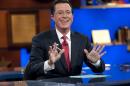 This Sept. 8, 2010 publicity photo released by Comedy Central shows host Stephen Colbert appears on "The Colbert Report," in New York. "The Colbert Report" will end on Thursday, Dec. 18, 2014, after nine seasons. (AP Photo/Comedy Central, Scott Gries)