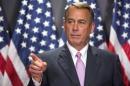 U.S. House Speaker Boehner calls on a reporter during a news conference after a Republican House caucus meeting on Capitol Hill in Washington