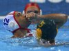 Spain's Gadea celebrates a goal past Australia's Younger during their men's preliminary round Group A water polo match at the London 2012 Olympic Games at the Water Polo Arena