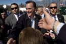 Republican presidential candidate, former Massachusetts Gov. Mitt Romney greets people in the crowd following a campaign event at an energy services company in Tunkhannock, Pa.., Thursday, April 5, 2012. (AP Photo/Steven Senne)