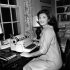 FILE - In this Oct. 5, 1960 file photo, Jacqueline Kennedy poses at her typewriter where she writes her weekly "Candidate's Wife" column in her Georgetown home in Washington.  President John F. Kennedy openly scorned the notion of Vice President Lyndon Baines Johnson succeeding him in office, according to a book of newly released interviews with his widow, former first lady Jacqueline Kennedy.  (AP Photo/File)
