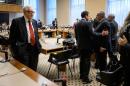 UN-Arab League envoy Lakhdar Brahimi (L) stands prior to the start of a meeting on Syria on December 20, 2013 at the United Nations offices in Geneva