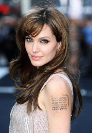 Angelina Jolie has tattoos on her arm that signify each of her six children