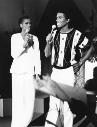 FILE - In this July 25, 1984, file photo, Whitney Houston, left, and Jermaine Jackson sing during a rehearsal for the CBS television soap opera "As the World Turns" in New York. Publicist Kristen Foster said, Saturday, Feb. 11, 2012, that singer Whitney Houston has died at age 48. (AP Photo/Marty Lederhandler, File)