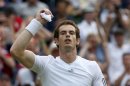 Andy Murray of Britain celebrates after defeating Fernando Verdasco of Spain in their men's quarter-final tennis match at the Wimbledon Tennis Championships, in London