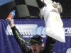 Kyle Busch celebrates his victory in the NASCAR Sprint Cup Series auto race at Michigan International Speedway in Brooklyn, Mich., Sunday, Aug. 21, 2011. (AP Photo/Paul Sancya)