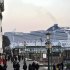 In this photo taken on Jan. 27, 2012 a cruise liner sails past the Giudecca canal in Venice, Italy. The fatal grounding of the Costa Concordia off the Tuscan coast has sharpened the focus on the largely unchecked boom of these ever-larger luxury liners, and nowhere more so than in Venice, a fragile city already struggling against mass tourism and the steady deterioration of its underwater foundations. There's growing clamor for an urgent rethink to the expanding cruise liner traffic through Venice's historic center. Critics point not only to a threat of accidents, but also air and water pollution, and the injection of an additional 2 million more tourists a year into a city already under constant siege. (AP Photo/Luigi Costantini)