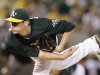 Oakland Athletics' Jarrod Parker works against the Texas Rangers in the first inning of a baseball game Monday, Oct. 1, 2012, in Oakland, Calif. (AP Photo/Ben Margot)