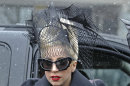 Lady Gaga walks through the campus prior to an event at Harvard University in Cambridge, Mass. Wednesday Feb. 29, 2012. Gaga launched her 