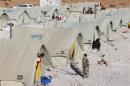 A general view shows tents set up by the U.N. for Syrian refugees at the Lebanese border town of Arsal