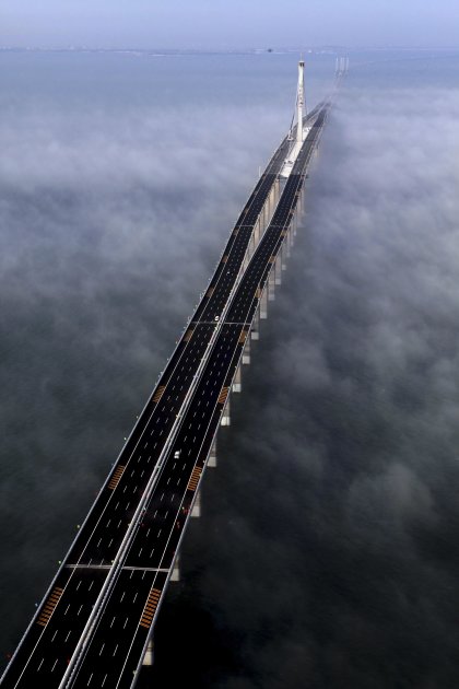 This photo taken Wednesday, June 29, 2011 released by China's Xinhua news agency shows the Jiaozhou Bay Bridge in Qingdao, east China's Shandong Province. China opened Thursday, June 30, 2011, the wor