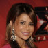 FILE - In this Dec. 22, 2011 file photo, singer Paula Abdul poses on the red carpet at The X Factor Finale show in Los Angeles. Abdul said she's leaving "The X Factor" after one season as judge. (AP Photo/Dan Steinberg, file)