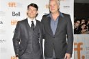 Actors Patrick Fugit and Tim Robbins pose at the gala presentation for the film "Thanks For Sharing" at the Toronto International Film Festival