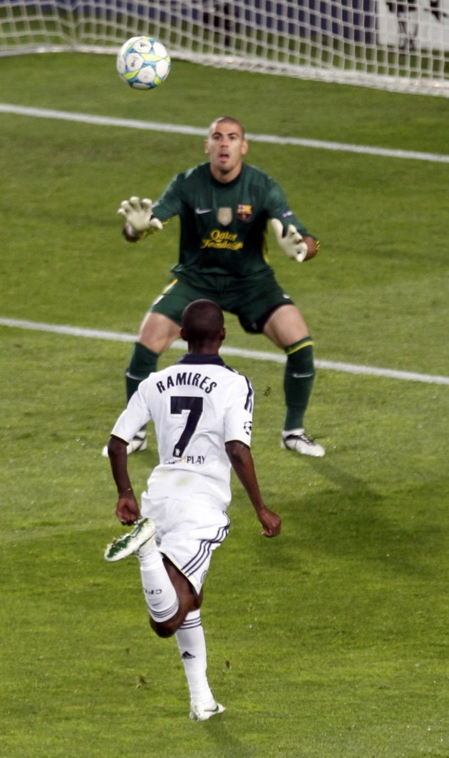 Chelsea's Ramires scores a goal over Barcelona's Valdes during their Champions League soccer semi-final in Barcelona