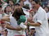 **CORRECTS MOTHERS NAME TO MOLLY** Bubba Watson hugs his mother Molly along with caddie Ted Scott after winning the Masters golf tournament following a sudden death playoff on the 10th hole Sunday, April 8, 2012, in Augusta, Ga.  (AP Photo/Chris O'Meara)
