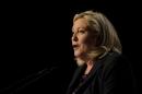 French far-right National Front leader Marine Le Pen delivers a speech following the announcement of results in the second round of French regional elections in Henin-Beaumont on December 13, 2015