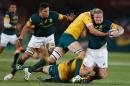 South African hooker and Captain Adriaan Strauss (R) vies with Australia's players during the Castle Lager Rugby Championship International test match between South Africa and Australia at Loftus Versfeld Stadium on October 1, 2016