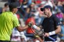 Andy Murray, of Great Britain, right, shakes hands with Vasek Pospisil, of Canada, after their match at the BNP Paribas Open tennis tournament, Saturday, March 14, 2015, in Indian Wells, Calif. (AP Photo/Mark J. Terrill)