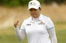 Inbee Park of South Korea reacts after making a birdie putt on the 6th hole during the second round of the 2013 U.S. Women's Open golf championship at the Sebonack Golf Club in Southampton