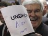 Republican presidential candidate, former House Speaker Newt Gingrich, displays an autographed sign during a campaign stop at Tommy’s Country Ham House, Saturday, Jan. 21, 2012, in Greenville, S.C., on South Carolina's Republican primary election day. (AP Photo/Matt Rourke)
