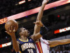 Indiana Pacers guard Leandro Barbosa (28) goes up for a shot against Miami Heat forward Shane Battier during the first half of Game 2 in an NBA basketball Eastern Conference semifinal playoff series, Tuesday, May 15, 2012, in Miami. (AP Photo/Wilfredo Lee)