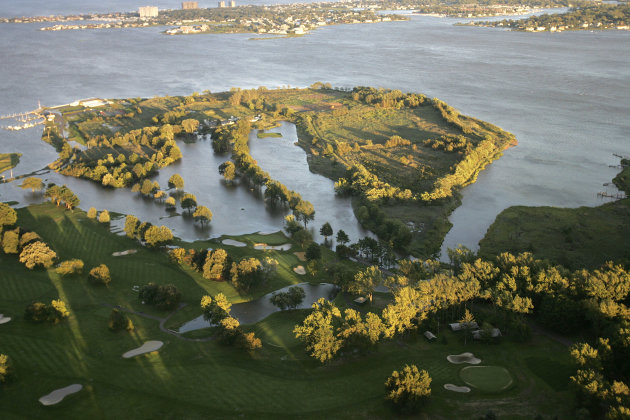 ADDS NAME AND LOCATION OF GOLF COURSE - Large sections of the golf course at Rumson Country Club in Rumson, N.J.  are flooded by Hurricane Irene Sunday, Aug. 28, 2011. (AP Photo/Rich Schultz)