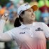 Inbee Park throws the ball up into the stands after winning a sudden death play during the LPGA Championship golf tournament at Locust Hill Country Club in Pittsford, N.Y. , on Sunday June 9, 2013 (AP Photo/Gary Wiepert)