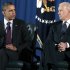 President Barack Obama and Vice President Joe Biden look at each other as they participate in a ceremony at Andrews Air Force Base, Md., Tuesday, Dec. 20, 2011, marking the return of the United States Forces-Iraq Colors and the end of the war in Iraq. (AP Photo/Carolyn Kaster)