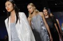 The Rag & Bone Spring 2014 collection is modeled during Fashion Week, Friday, Sept. 6, 2013, in New York. (AP Photo/Louis Lanzano)