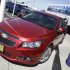 FILE - In this Aug. 30, 2011 file photo a 2011 Chevrolet Cruze is featured at a car dealership in San Jose, Calif. General Motors Co. said Thursday, Feb. 16, 2012, it made more money in 2011 than any year in its history.  (AP Photo/Paul Sakuma)
