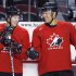 Sidney Crosby, left, and Jarome Iginla, chat during a practice at the Men's National Olympic Hockey Team orientation camp in Calgary, Tuesday, Aug. 25, 2009. The Calgary Flames Hockey Club have traded team captain Jarome Iginla in exchange for forwards Kenneth Agostino and Ben Hanowski and the Pittsburgh Penguins 2013 first round pick. (AP Photo/The Canadian Press, Fred Chartrand, file)