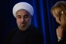 Iranian President Hassan Rouhani answers questions during an Asia Society event on the sidelines of the 68th United Nations General Assembly, in New York, September 26, 2013